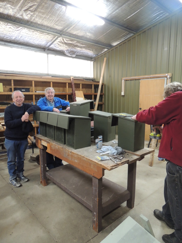 Desmond, David, and Rick from the Thurgoona Men's Shed constructing Squirrel Glider nest boxes for Albury Conservation Company, 15 July 2014 (Photo by Sam Niedra)