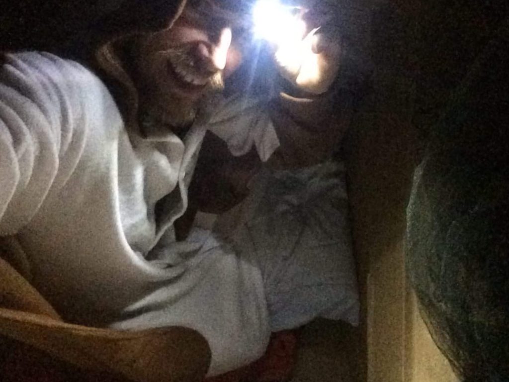 Nigel Jones sleeping in a tree as part of his Edge Pledge challenge.